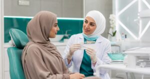 Dental consultation about laser teeth whitening risks in a modern UAE clinic